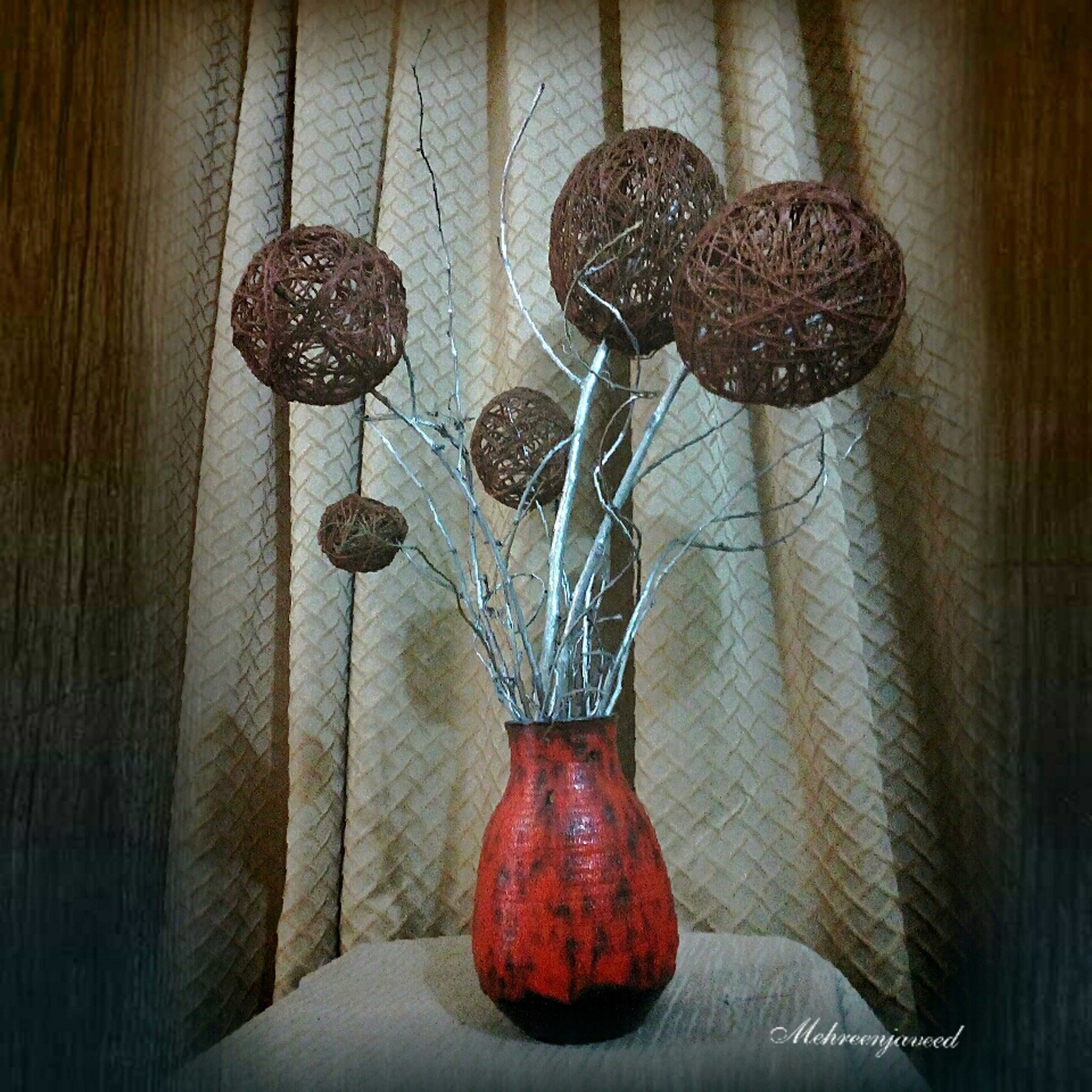 Home decorate from branches and Balls of thread 