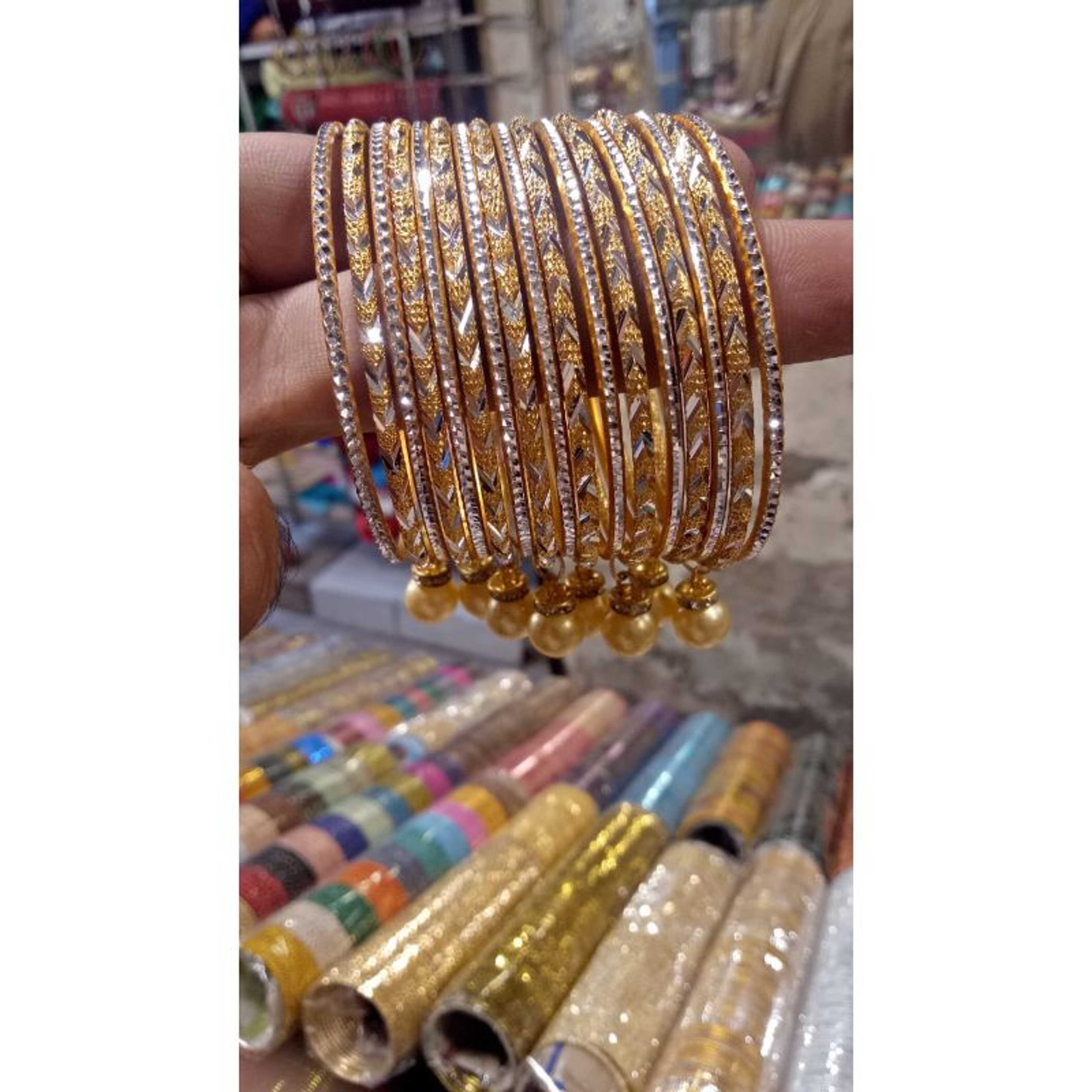 Bangles Set With Golden Pearls